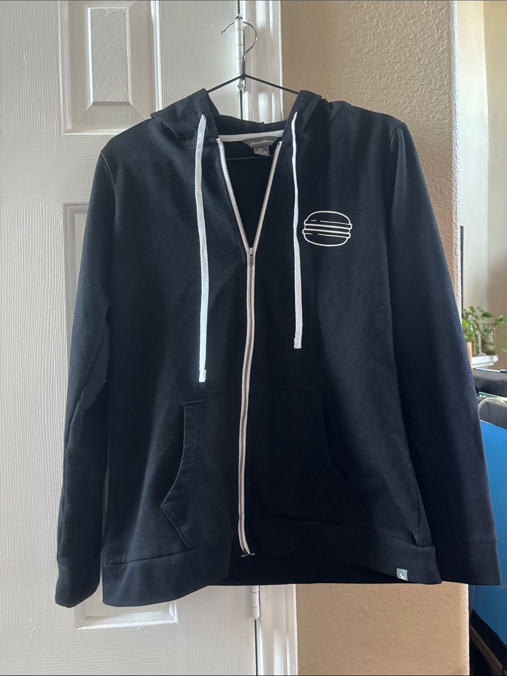 Eddie Bauer Black Zip-Up Hoodie with White Trim and Burger Logo